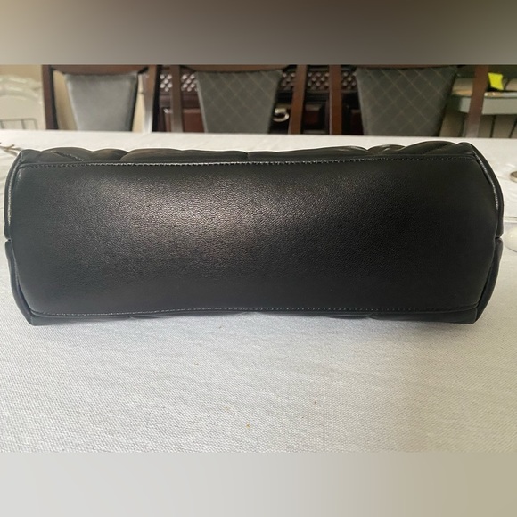 Saint Laurent PUFFER MEDIUM IN NAPPA LEATHER BLACK. $3,650 - Picture 10 of 12